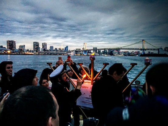 Lighting the Menorah on the deck of the cruise ship